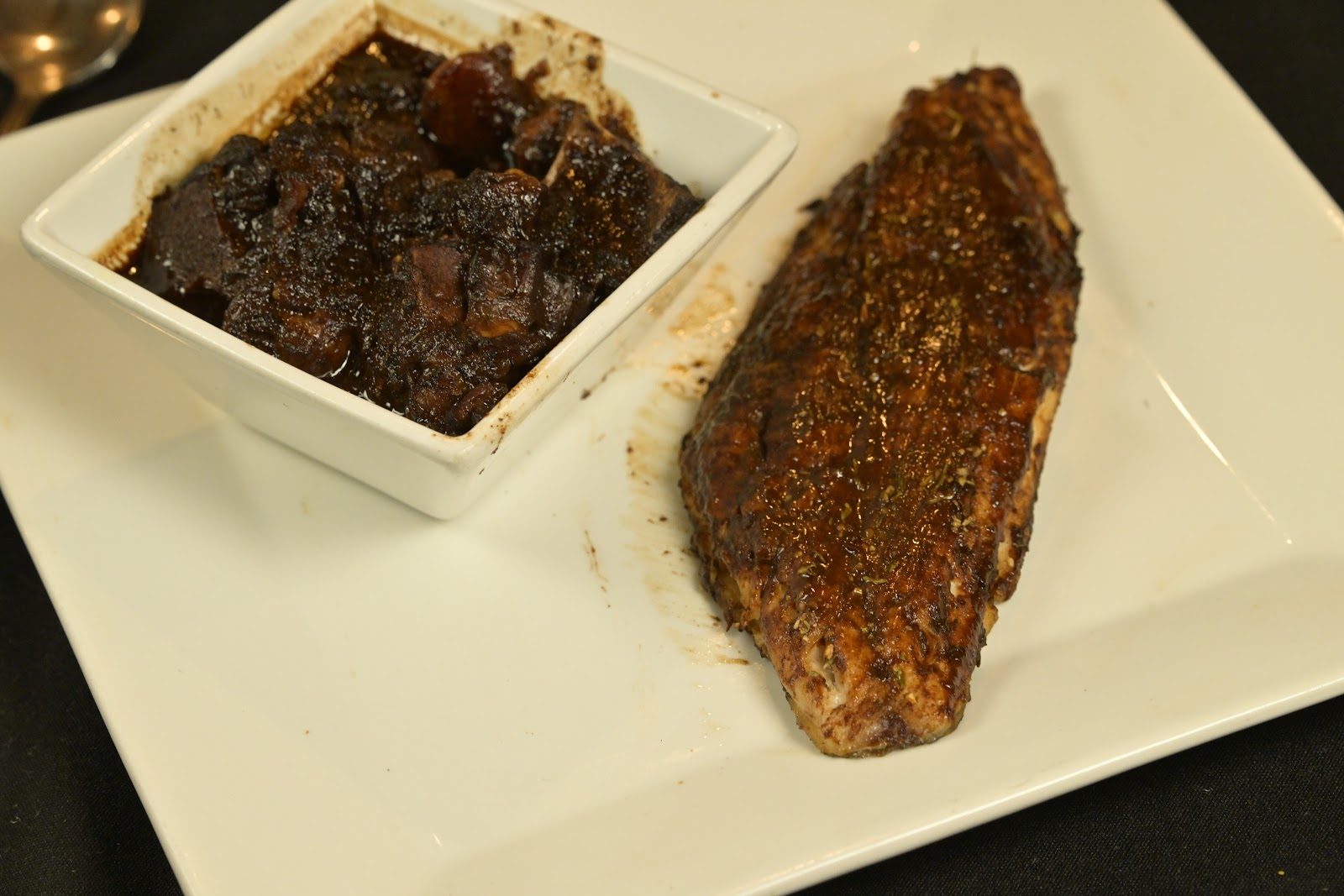 Snapper fillet served with oxtail stew